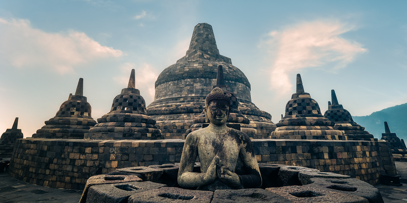 Borobudur Temple Buddhist monument surrounded by mountains in Central Java