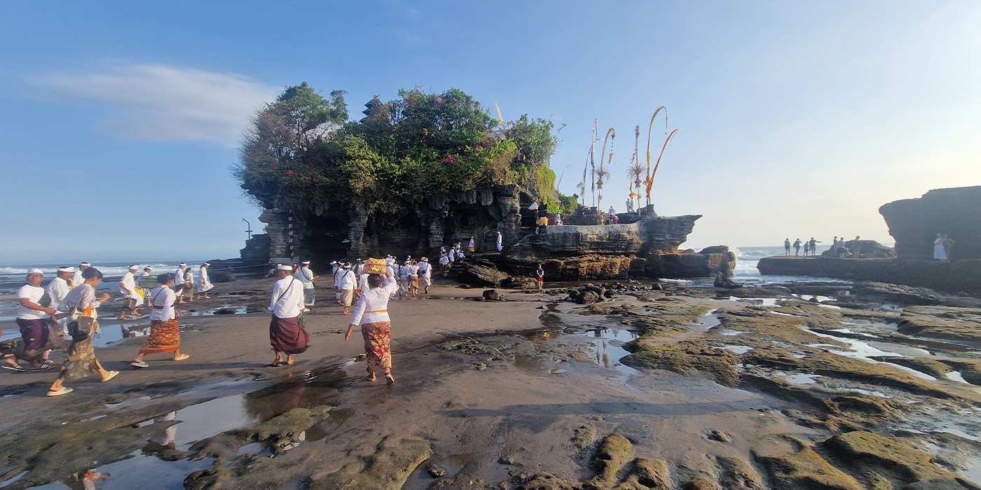 Tanah Lot Temple on a rocky island off the coast of Bali