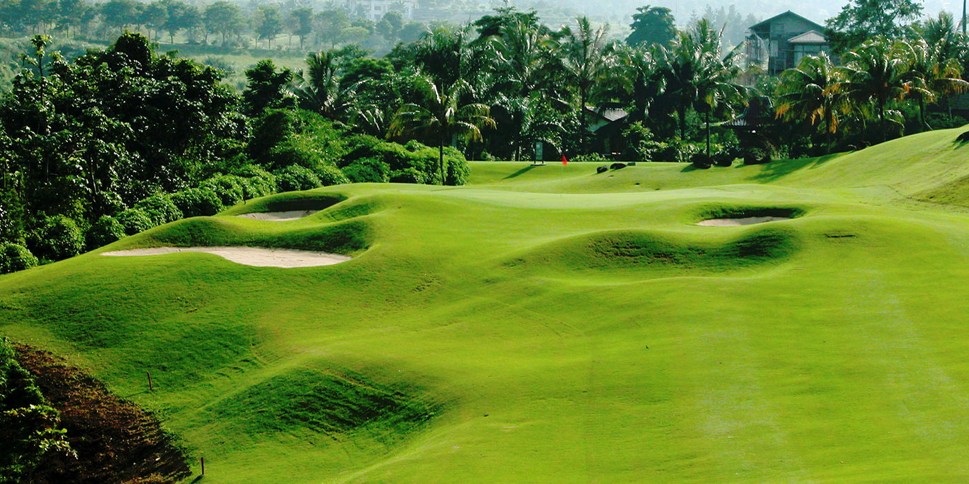 Gunung Geulis Golf Course in Bogor surrounded by lush tropical hills