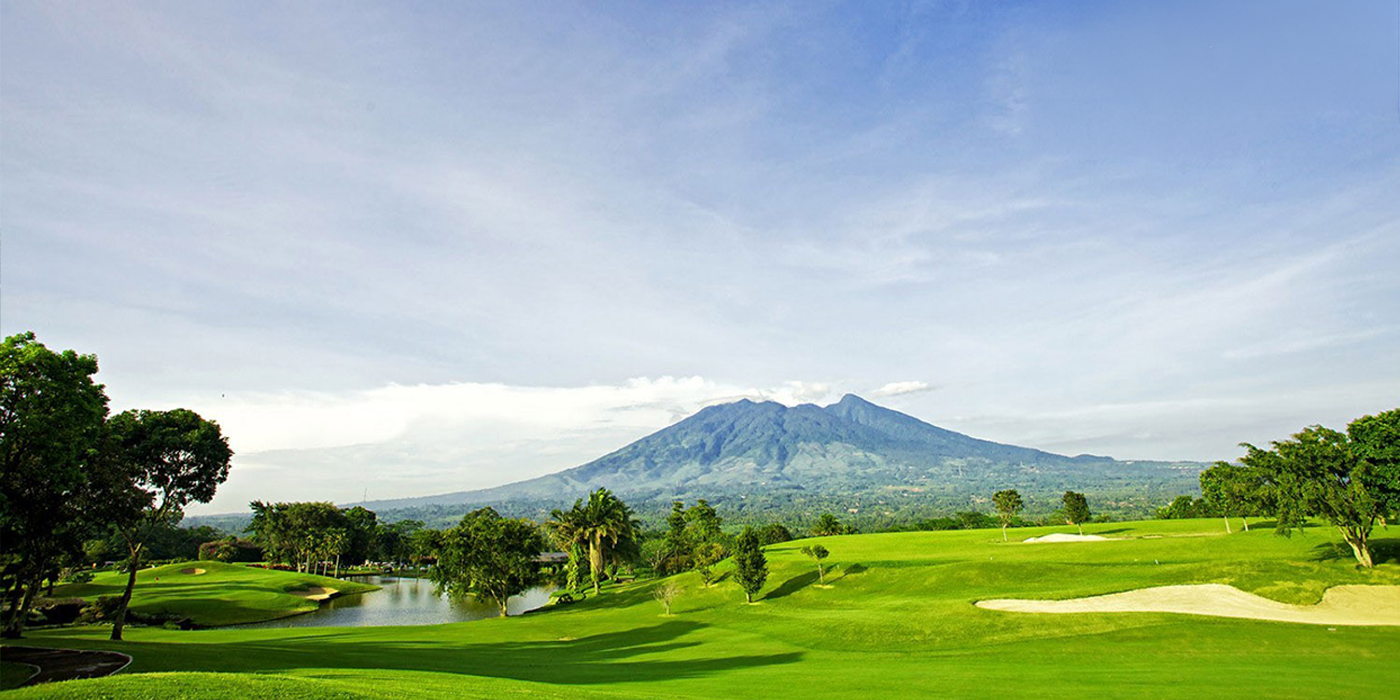 Rancamaya Golf fairway with Mount Salak view in Bogor Indonesia